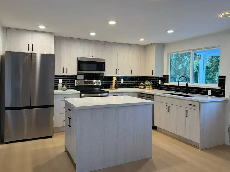 Completed kitchen or home project featuring Metallic White