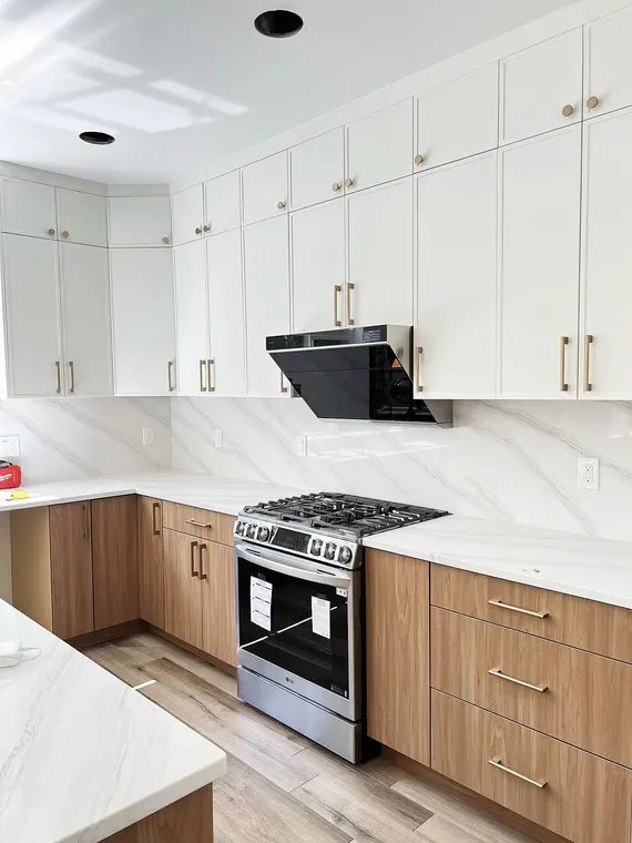 Completed kitchen or home project featuring Slim Simply White, Kanas Oak