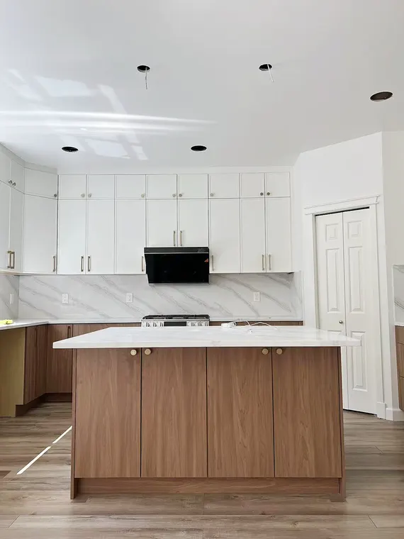 Completed kitchen or home project featuring Slim Simply White, Kanas Oak