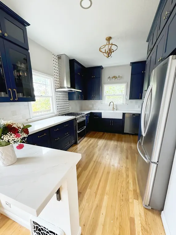 Completed kitchen or home project featuring Blue Shaker, TK710-Calacatta Vatino